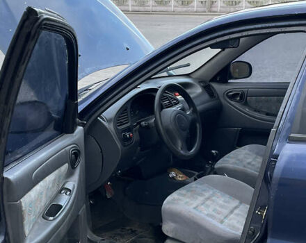 Синий Дэу Ланос, объемом двигателя 1.5 л и пробегом 147 тыс. км за 1050 $, фото 7 на Automoto.ua