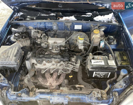 Синій Деу Ланос, об'ємом двигуна 1.35 л та пробігом 325 тис. км за 1300 $, фото 13 на Automoto.ua