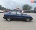 Синий Дэу Ланос, объемом двигателя 1.5 л и пробегом 238 тыс. км за 2050 $, фото 2 на Automoto.ua