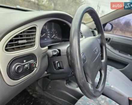 Синій Деу Ланос, об'ємом двигуна 1.6 л та пробігом 371 тис. км за 1800 $, фото 19 на Automoto.ua
