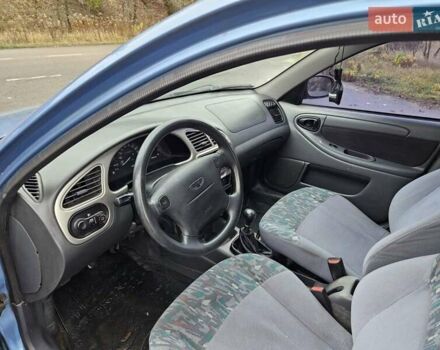 Синій Деу Ланос, об'ємом двигуна 1.6 л та пробігом 371 тис. км за 1800 $, фото 14 на Automoto.ua
