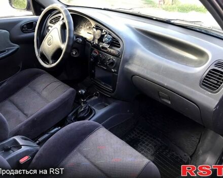 Синий Дэу Ланос, объемом двигателя 1.5 л и пробегом 222 тыс. км за 2700 $, фото 4 на Automoto.ua