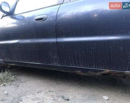 Синий Дэу Ланос, объемом двигателя 1.5 л и пробегом 280 тыс. км за 1100 $, фото 7 на Automoto.ua