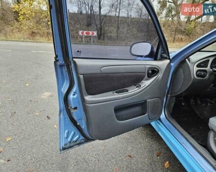Синій Деу Ланос, об'ємом двигуна 1.6 л та пробігом 371 тис. км за 1800 $, фото 28 на Automoto.ua