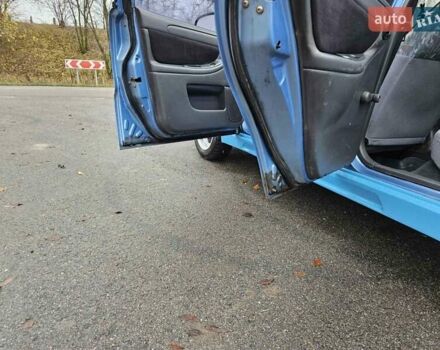 Синій Деу Ланос, об'ємом двигуна 1.6 л та пробігом 371 тис. км за 1800 $, фото 26 на Automoto.ua