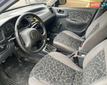 Синій Деу Ланос, об'ємом двигуна 1.5 л та пробігом 300 тис. км за 1500 $, фото 14 на Automoto.ua