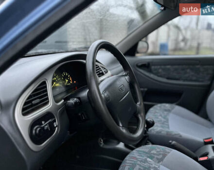 Синий Дэу Ланос, объемом двигателя 1.6 л и пробегом 107 тыс. км за 2999 $, фото 13 на Automoto.ua