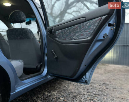 Синий Дэу Ланос, объемом двигателя 1.6 л и пробегом 107 тыс. км за 2999 $, фото 20 на Automoto.ua