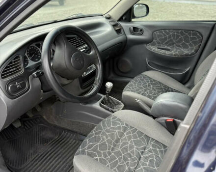 Синий Дэу Ланос, объемом двигателя 1.5 л и пробегом 180 тыс. км за 2500 $, фото 16 на Automoto.ua