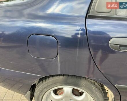 Синій Деу Ланос, об'ємом двигуна 1.5 л та пробігом 173 тис. км за 2700 $, фото 21 на Automoto.ua