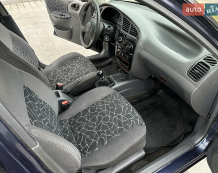 Синій Деу Ланос, об'ємом двигуна 1.5 л та пробігом 177 тис. км за 2600 $, фото 36 на Automoto.ua