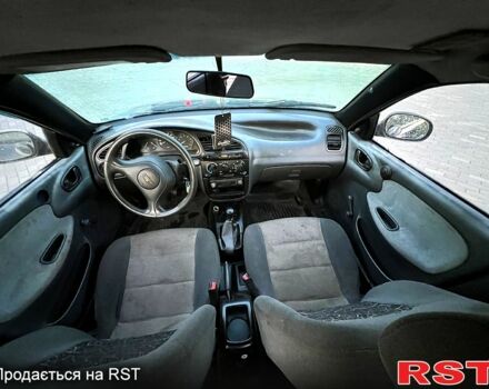 Синий Дэу Ланос, объемом двигателя 1.3 л и пробегом 200 тыс. км за 1070 $, фото 5 на Automoto.ua