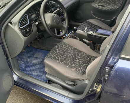 Синий Дэу Ланос, объемом двигателя 1.5 л и пробегом 329 тыс. км за 2400 $, фото 6 на Automoto.ua