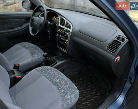 Синий Дэу Ланос, объемом двигателя 1.6 л и пробегом 107 тыс. км за 2999 $, фото 22 на Automoto.ua