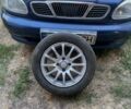 Синий Дэу Ланос, объемом двигателя 1 л и пробегом 238 тыс. км за 3100 $, фото 1 на Automoto.ua