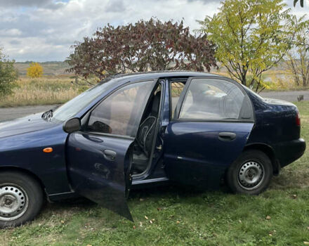 Синий Дэу Ланос, объемом двигателя 1.5 л и пробегом 220 тыс. км за 2300 $, фото 8 на Automoto.ua