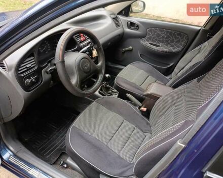 Синий Дэу Ланос, объемом двигателя 1.5 л и пробегом 212 тыс. км за 2550 $, фото 25 на Automoto.ua