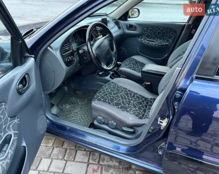 Синій Деу Ланос, об'ємом двигуна 1.6 л та пробігом 220 тис. км за 2900 $, фото 3 на Automoto.ua
