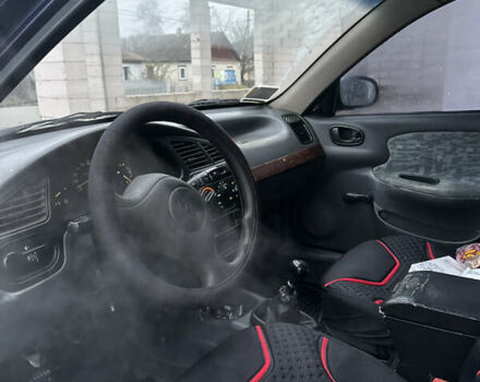 Синий Дэу Ланос, объемом двигателя 1.5 л и пробегом 303 тыс. км за 1450 $, фото 7 на Automoto.ua