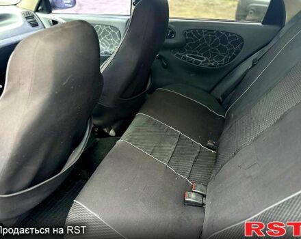 Синий Дэу Ланос, объемом двигателя 1.5 л и пробегом 180 тыс. км за 2100 $, фото 9 на Automoto.ua