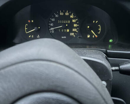 Синий Дэу Ланос, объемом двигателя 1.5 л и пробегом 303 тыс. км за 1450 $, фото 15 на Automoto.ua