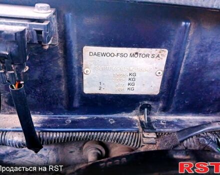 Синий Дэу Ланос, объемом двигателя 1.5 л и пробегом 300 тыс. км за 2200 $, фото 5 на Automoto.ua