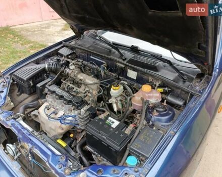 Синий Дэу Ланос, объемом двигателя 1.5 л и пробегом 212 тыс. км за 2550 $, фото 41 на Automoto.ua