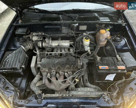 Синий Дэу Ланос, объемом двигателя 1.5 л и пробегом 303 тыс. км за 1450 $, фото 13 на Automoto.ua