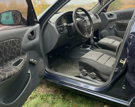 Синий Дэу Ланос, объемом двигателя 1.5 л и пробегом 220 тыс. км за 2300 $, фото 10 на Automoto.ua