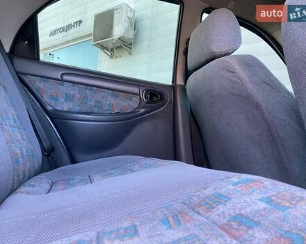 Синий Дэу Ланос, объемом двигателя 1.6 л и пробегом 250 тыс. км за 2900 $, фото 10 на Automoto.ua