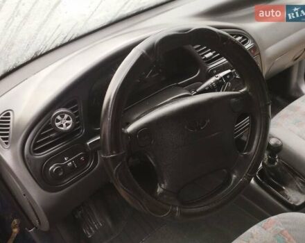 Синий Дэу Ланос, объемом двигателя 1.5 л и пробегом 223 тыс. км за 2199 $, фото 7 на Automoto.ua