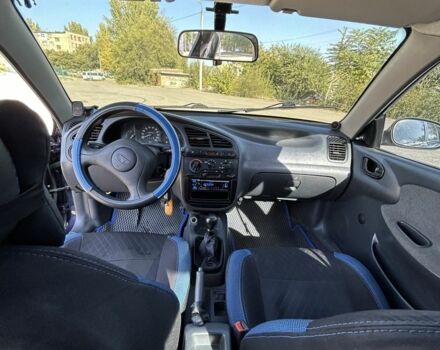 Синий Дэу Ланос, объемом двигателя 1.5 л и пробегом 214 тыс. км за 2500 $, фото 5 на Automoto.ua