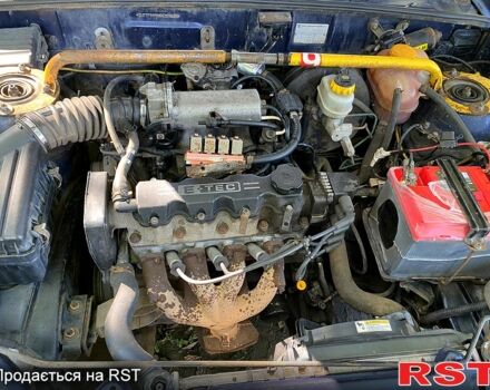 Синий Дэу Ланос, объемом двигателя 1.5 л и пробегом 102 тыс. км за 1260 $, фото 7 на Automoto.ua