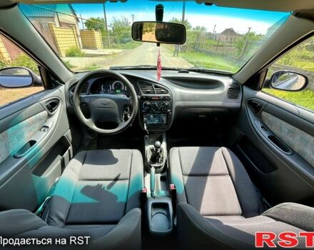 Синий Дэу Ланос, объемом двигателя 1.5 л и пробегом 200 тыс. км за 2350 $, фото 4 на Automoto.ua