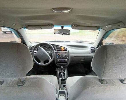 Деу Ланос 2005 у Кривому Розі на Automoto.ua Синій Деу Ланос, об'ємом двигуна 1.5 л та пробігом 200 тис. км за 2300 $, фото 18 на Automoto.ua