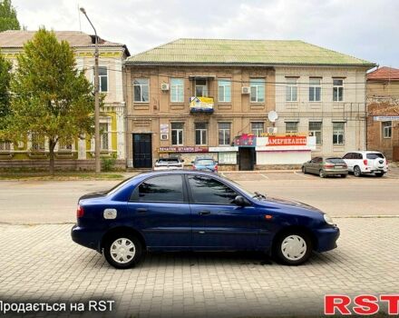 Синий Дэу Ланос, объемом двигателя 1.5 л и пробегом 250 тыс. км за 2100 $, фото 5 на Automoto.ua
