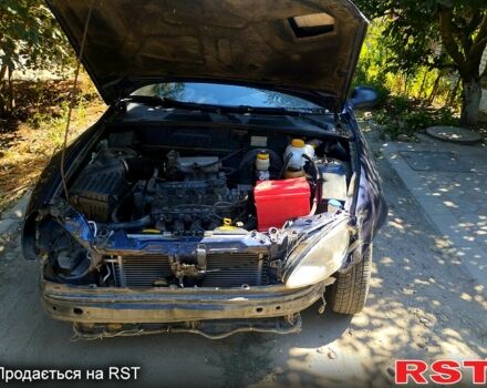 Синий Дэу Ланос, объемом двигателя 1.5 л и пробегом 290 тыс. км за 1200 $, фото 2 на Automoto.ua