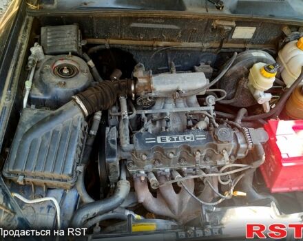 Синий Дэу Ланос, объемом двигателя 1.5 л и пробегом 290 тыс. км за 1200 $, фото 3 на Automoto.ua