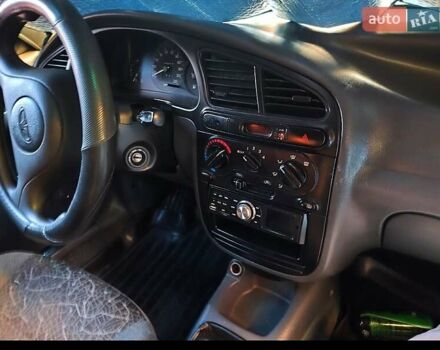 Синий Дэу Ланос, объемом двигателя 1.5 л и пробегом 228 тыс. км за 1650 $, фото 11 на Automoto.ua