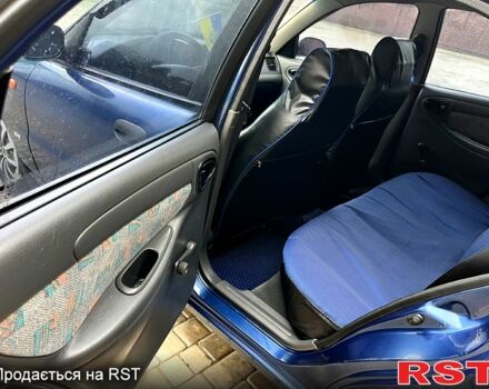 Синий Дэу Ланос, объемом двигателя 1.5 л и пробегом 188 тыс. км за 2850 $, фото 7 на Automoto.ua