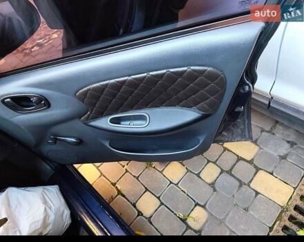 Синий Дэу Ланос, объемом двигателя 1.5 л и пробегом 228 тыс. км за 1650 $, фото 3 на Automoto.ua