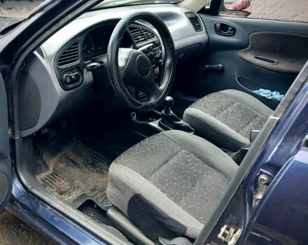 Синий Дэу Ланос, объемом двигателя 1.5 л и пробегом 220 тыс. км за 1450 $, фото 3 на Automoto.ua