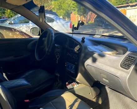 Синий Дэу Ланос, объемом двигателя 1.5 л и пробегом 190 тыс. км за 1640 $, фото 12 на Automoto.ua