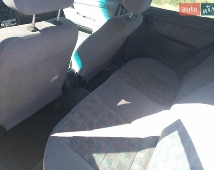 Синий Дэу Ланос, объемом двигателя 1.5 л и пробегом 304 тыс. км за 3500 $, фото 19 на Automoto.ua