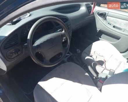 Синий Дэу Ланос, объемом двигателя 1.5 л и пробегом 304 тыс. км за 3500 $, фото 17 на Automoto.ua