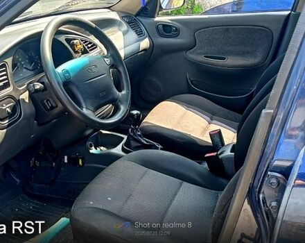 Синий Дэу Ланос, объемом двигателя 1.6 л и пробегом 314 тыс. км за 2700 $, фото 6 на Automoto.ua