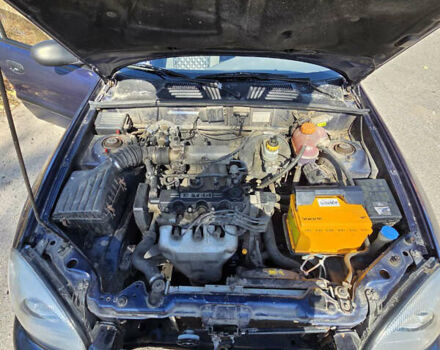 Синій Деу Ланос, об'ємом двигуна 1.5 л та пробігом 271 тис. км за 2100 $, фото 6 на Automoto.ua