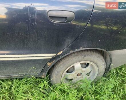 Синій Деу Ланос, об'ємом двигуна 1.5 л та пробігом 240 тис. км за 1500 $, фото 24 на Automoto.ua