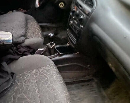 Синий Дэу Ланос, объемом двигателя 0 л и пробегом 200 тыс. км за 1300 $, фото 4 на Automoto.ua