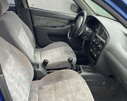 Синий Дэу Ланос, объемом двигателя 1.5 л и пробегом 330 тыс. км за 1399 $, фото 5 на Automoto.ua